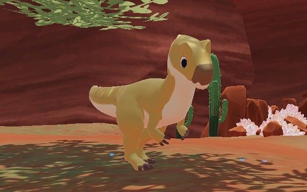 Yellow Allosaurus standing near some cacti and a Dreamstone formation in Ariacotta Canyon during the day in Paleo Pines.