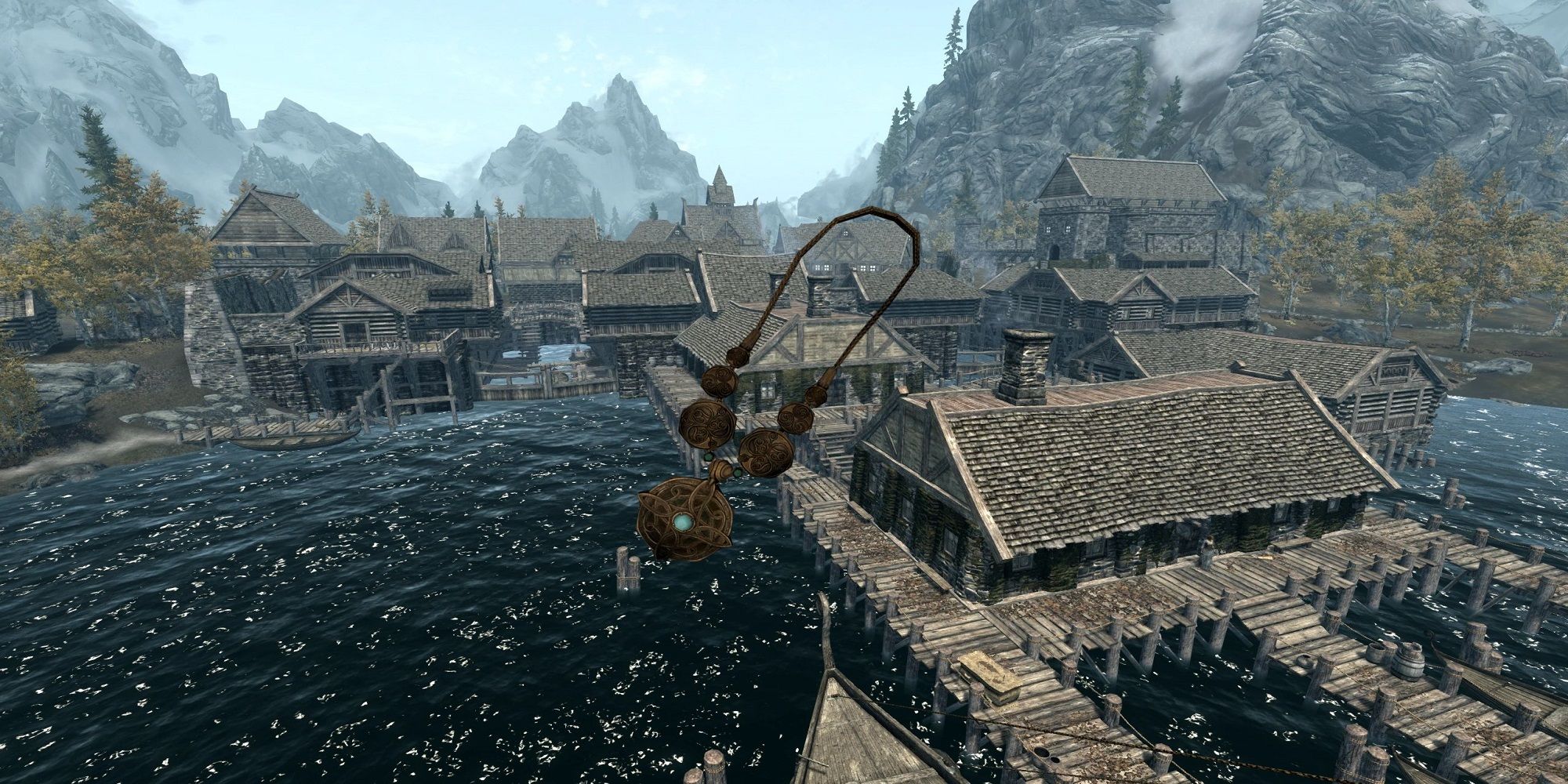 The Amulet of Mara superimposed over the city of Riften in Skyrim