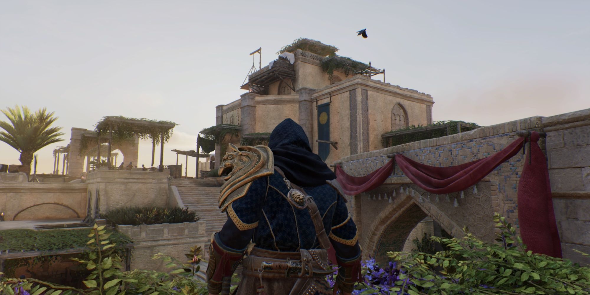 Basim looking at the rooftop of Qasr Salih in Assassin's Creed Mirage