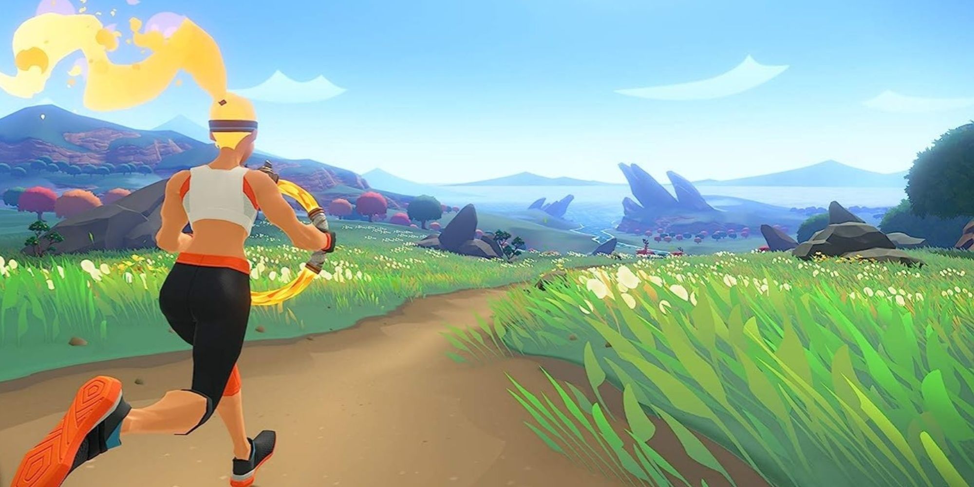 player holding ring con and running through a field in ring fit adventure