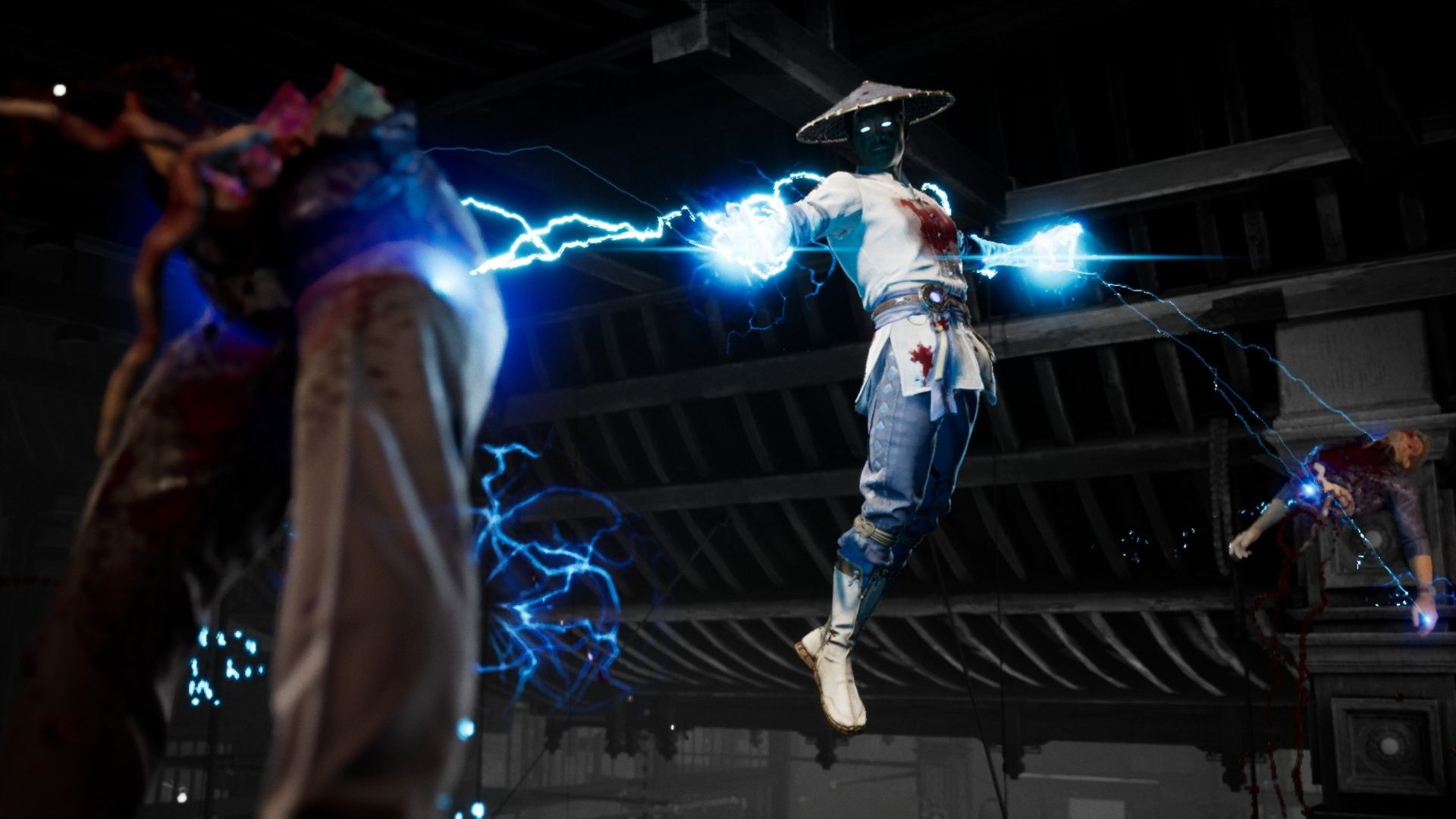 Raiden using his first Fatality on Johnny Cage, electrocuting both halves of his body in Mortal Kombat 1.