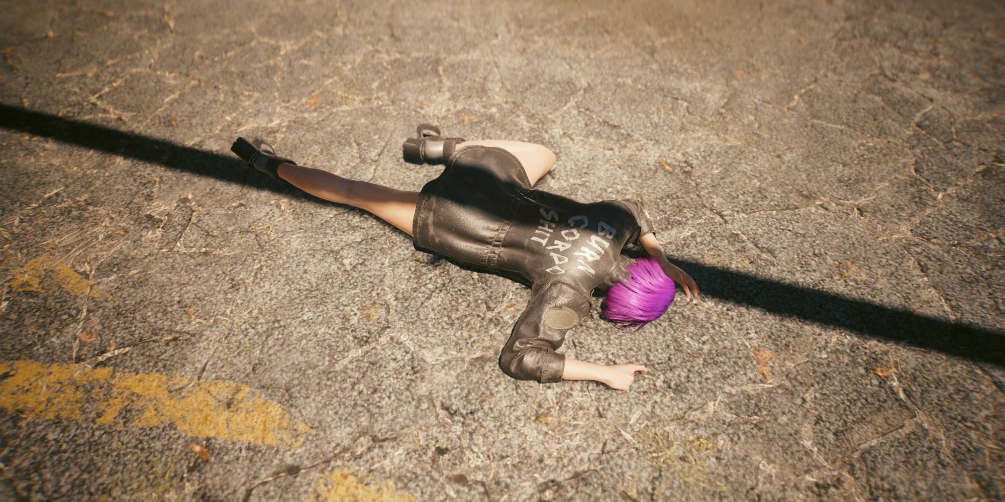 The player character in Cyberpunk 2077 after falling over, face first on the pavement. 