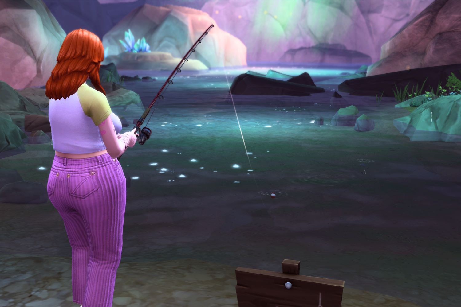 A feminine Sim in pink pants and a green top fishes at the Forgotten Grotto. Crystal formations sparkle in the background as she fishes in the dark pond.