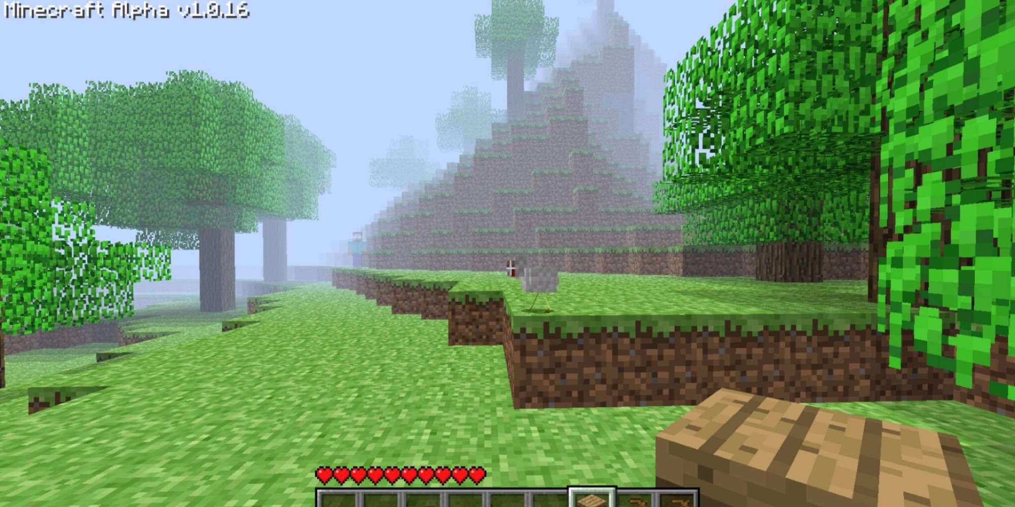 A screenshot from Minecraft Alpha depicting a foggy world and Herobrine