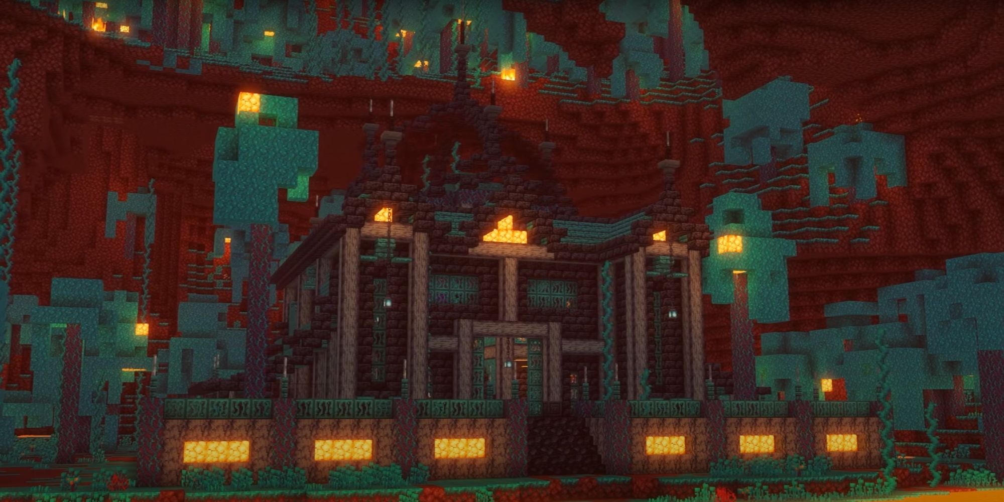 An image from Minecraft of a moderately sized castle made completely out of blocks collected in the nether. 