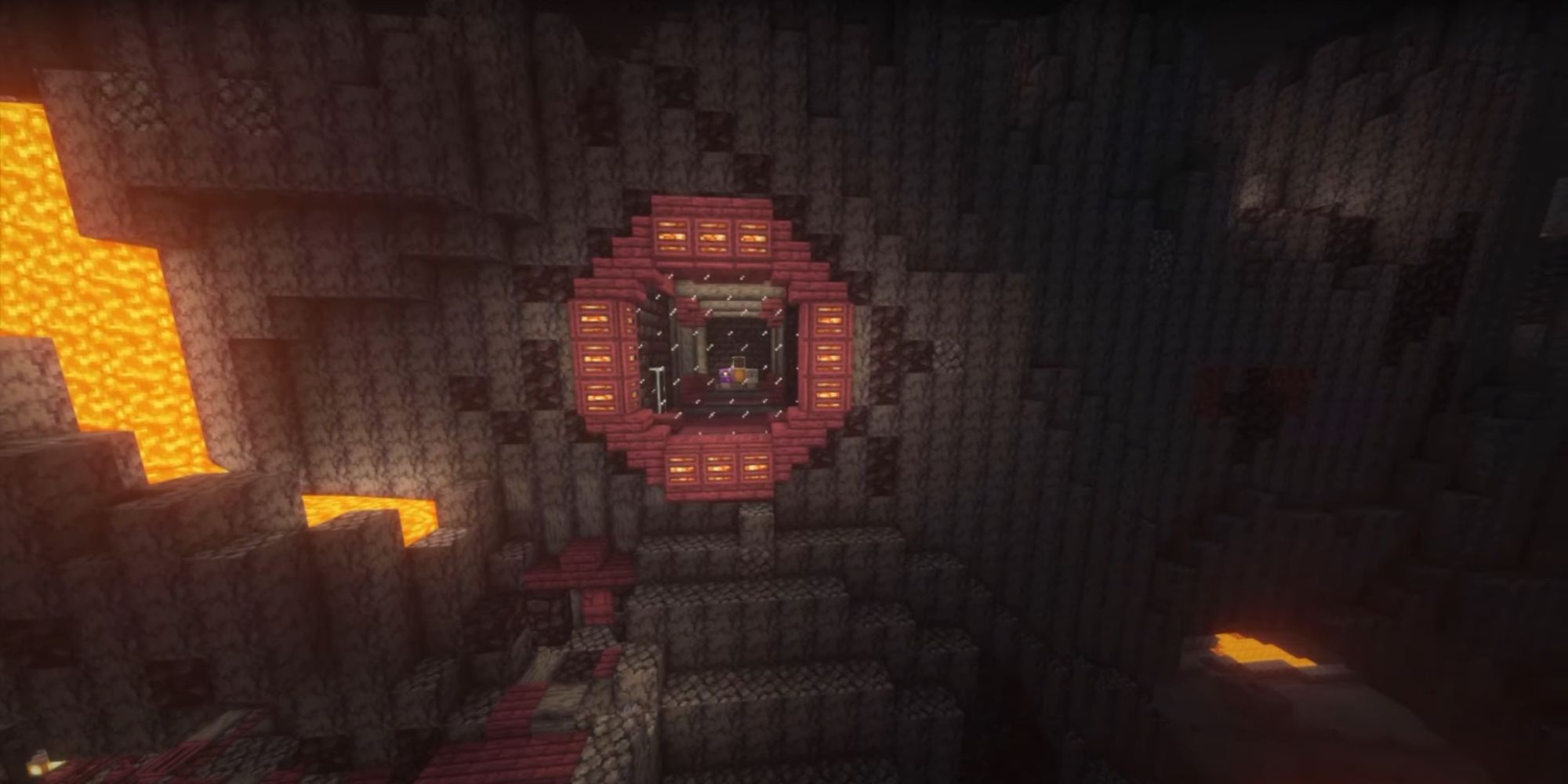 An image from Minecraft of a nether base that is carved into the side of a basalt mountain, thus creating a safe interior area away from dangerous lava and mobs.