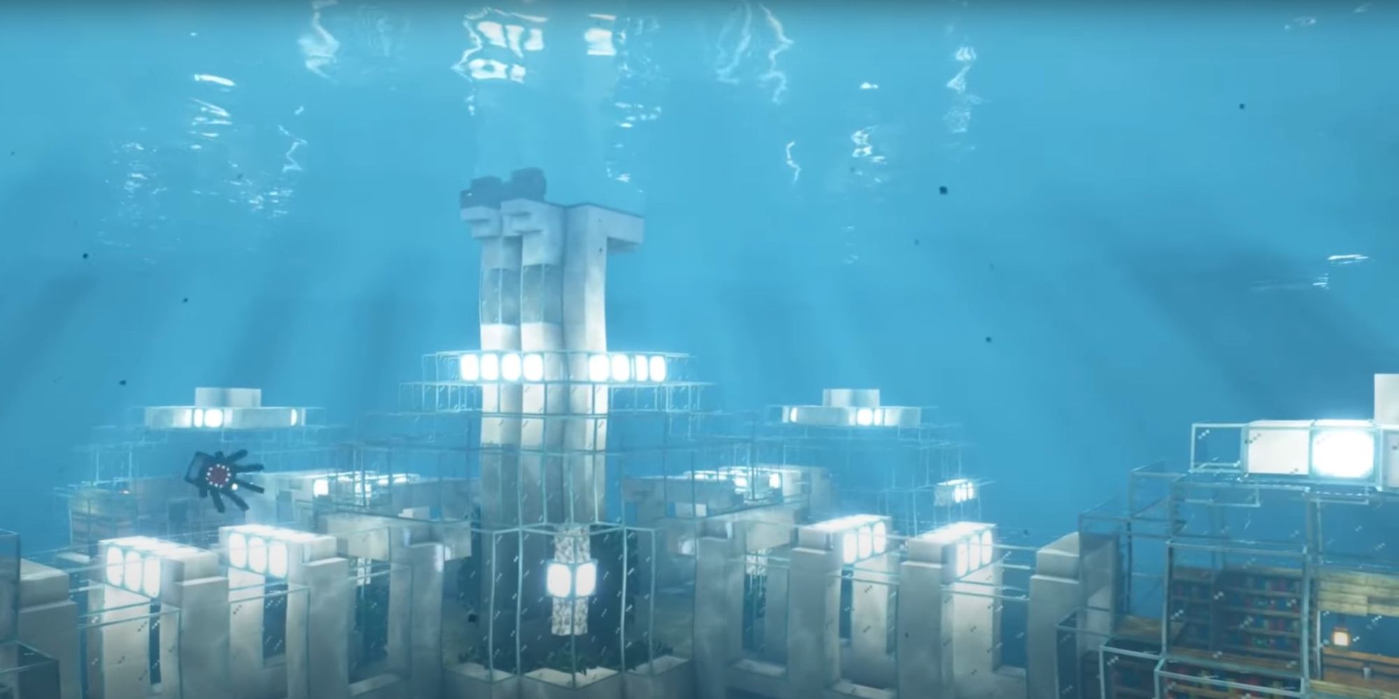An image from Minecraft of a large underwater base with glass domes and a large elevator that takes you to the surface.