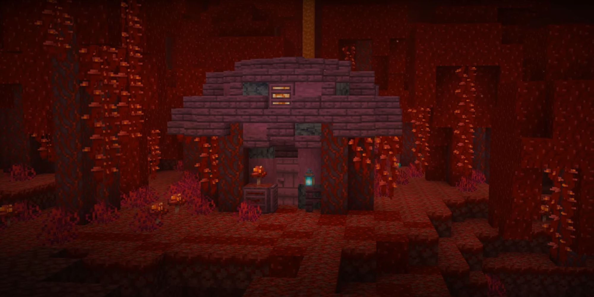 An image from Minecraft of a Wooden Nether House built out of crimson planks.
