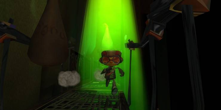 Raz running towards the screen in a ray of green light.