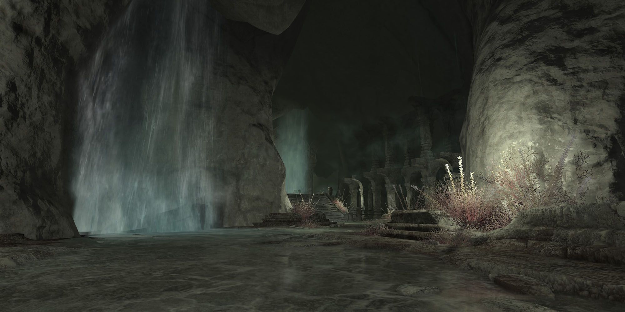a cave and waterfall at the entrance to the drowned city of skalla dungeon