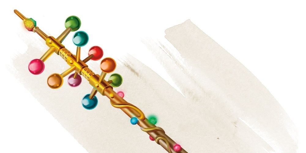 Wand of Wonder From Dungeons & Dragons, A Gold Wand Covered With Colorful Baubles