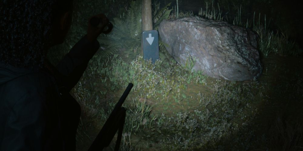 a broken sign indicating the location of a Cult Stash key in Alan Wake 2