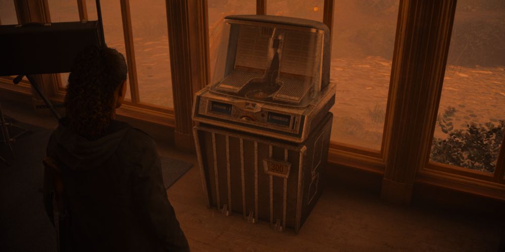 Saga Anderson stands in front of the jukebox in Valhalla Nursing Home in Alan Wake 2