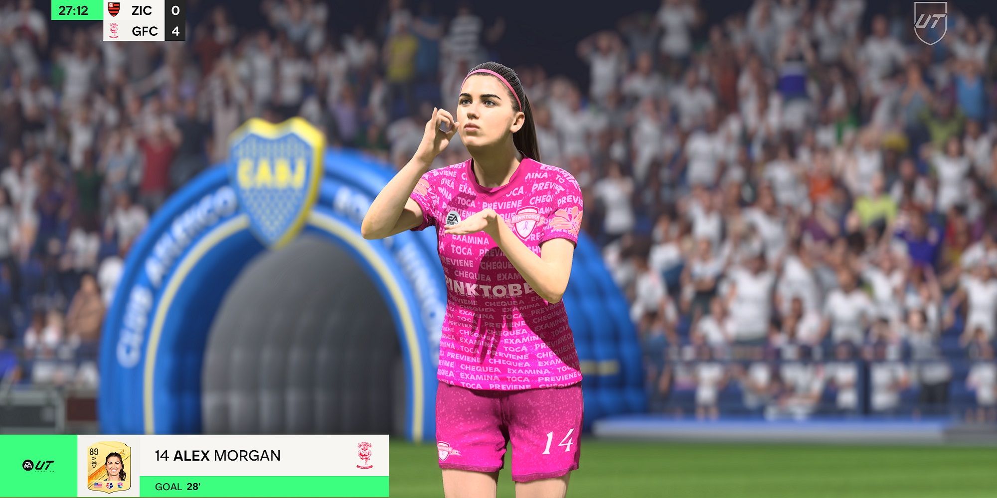 alex morgan wearing a pink kit and doing her signature teacup celebration in ea sports fc 24