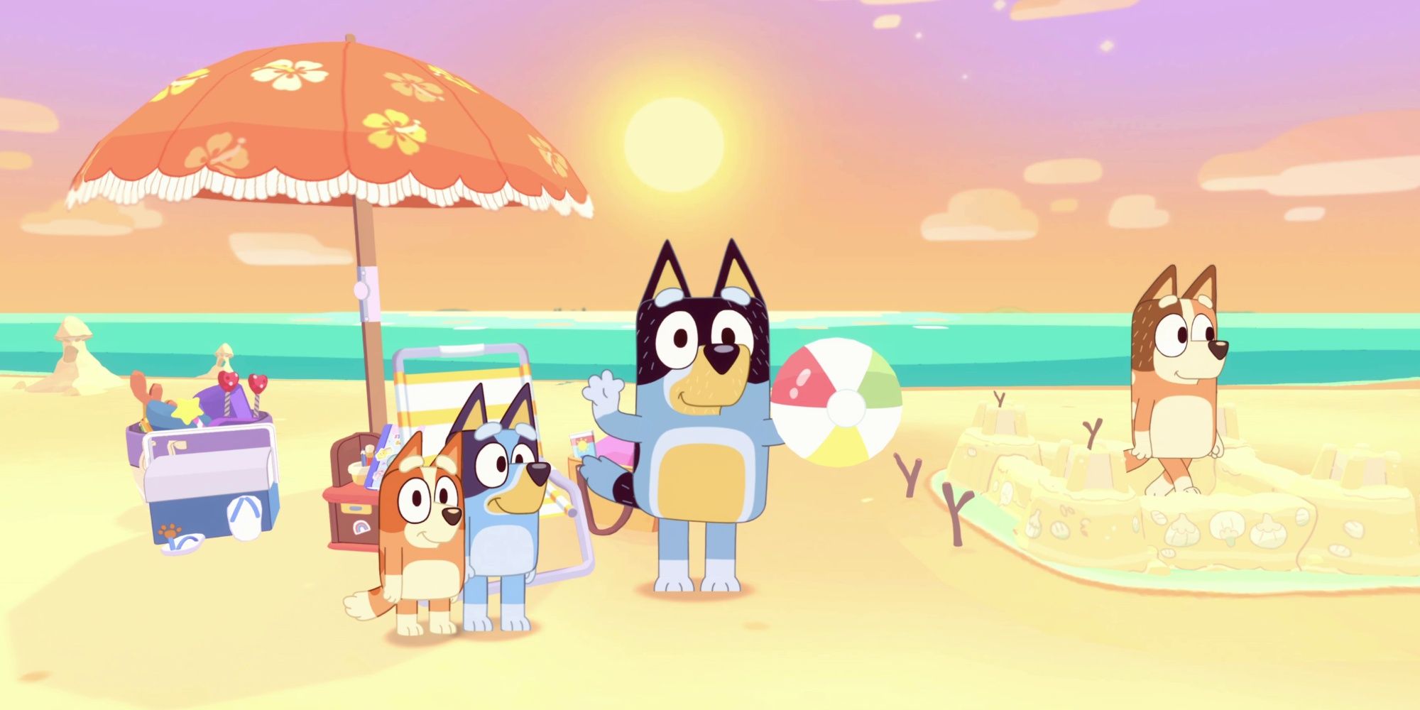 bandit waving with the rest of bluey's family on the beach