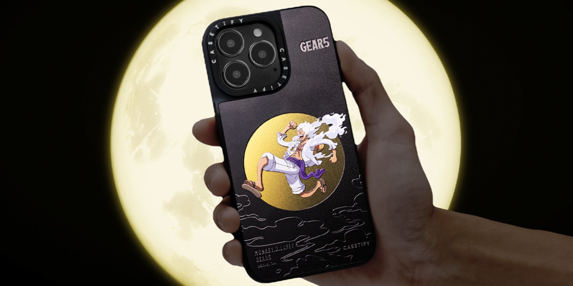 someone holding a phone with a gear 5 luffy casetify case on it