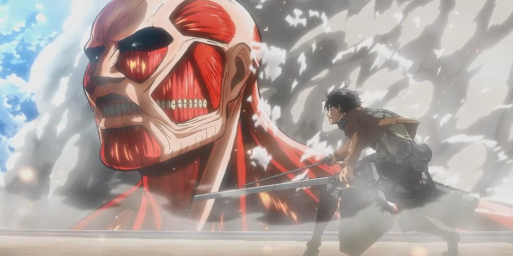 The Colossal Titan looms over a wall and stares at Eren.