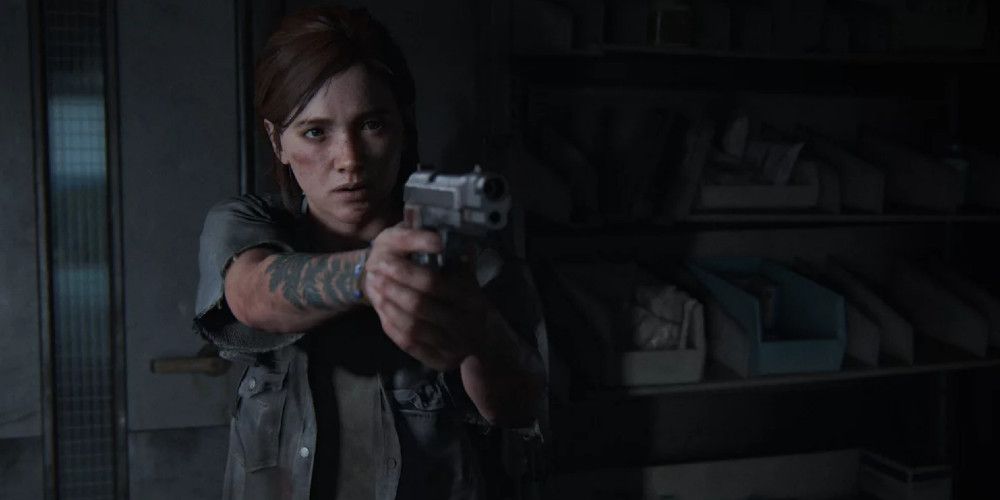 Ellie pointing a gun at someone in The Last of Us Part 2