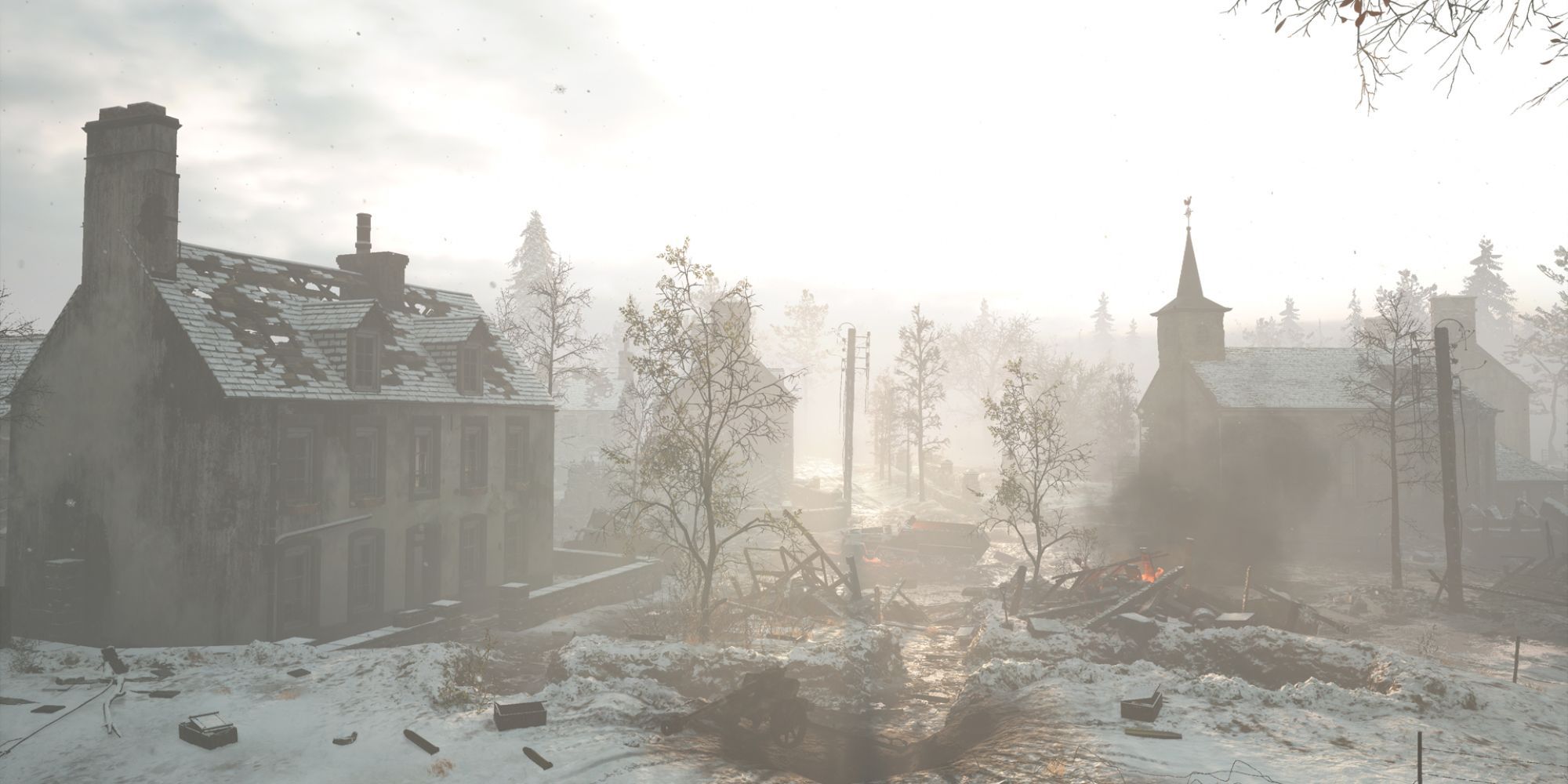 a snowy and hazy town with church and burnt out tank nearby