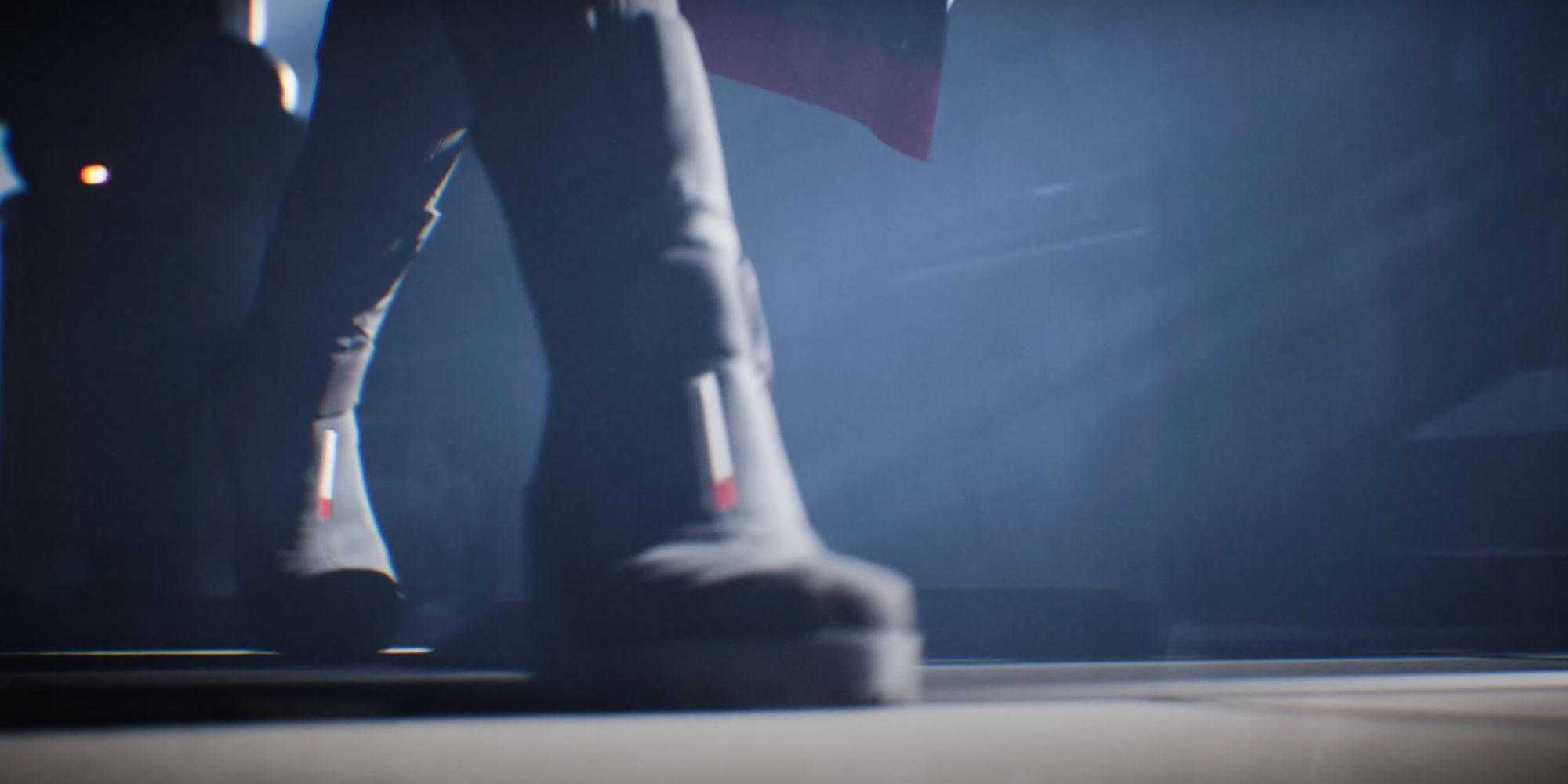 A screenshot from a teaser for the next Mass Effect game. It shows someone's boots, walking down a hallway