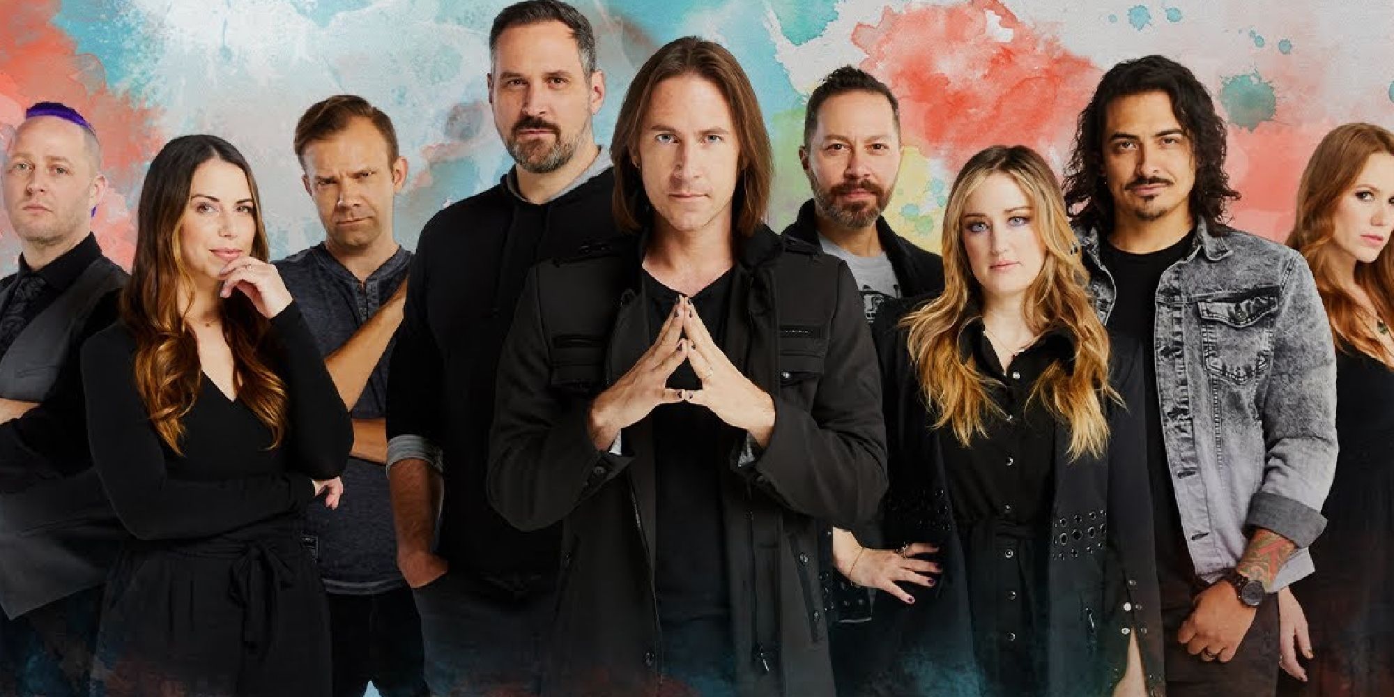Matt Mercer standing at the front in a Critical Role cast photo