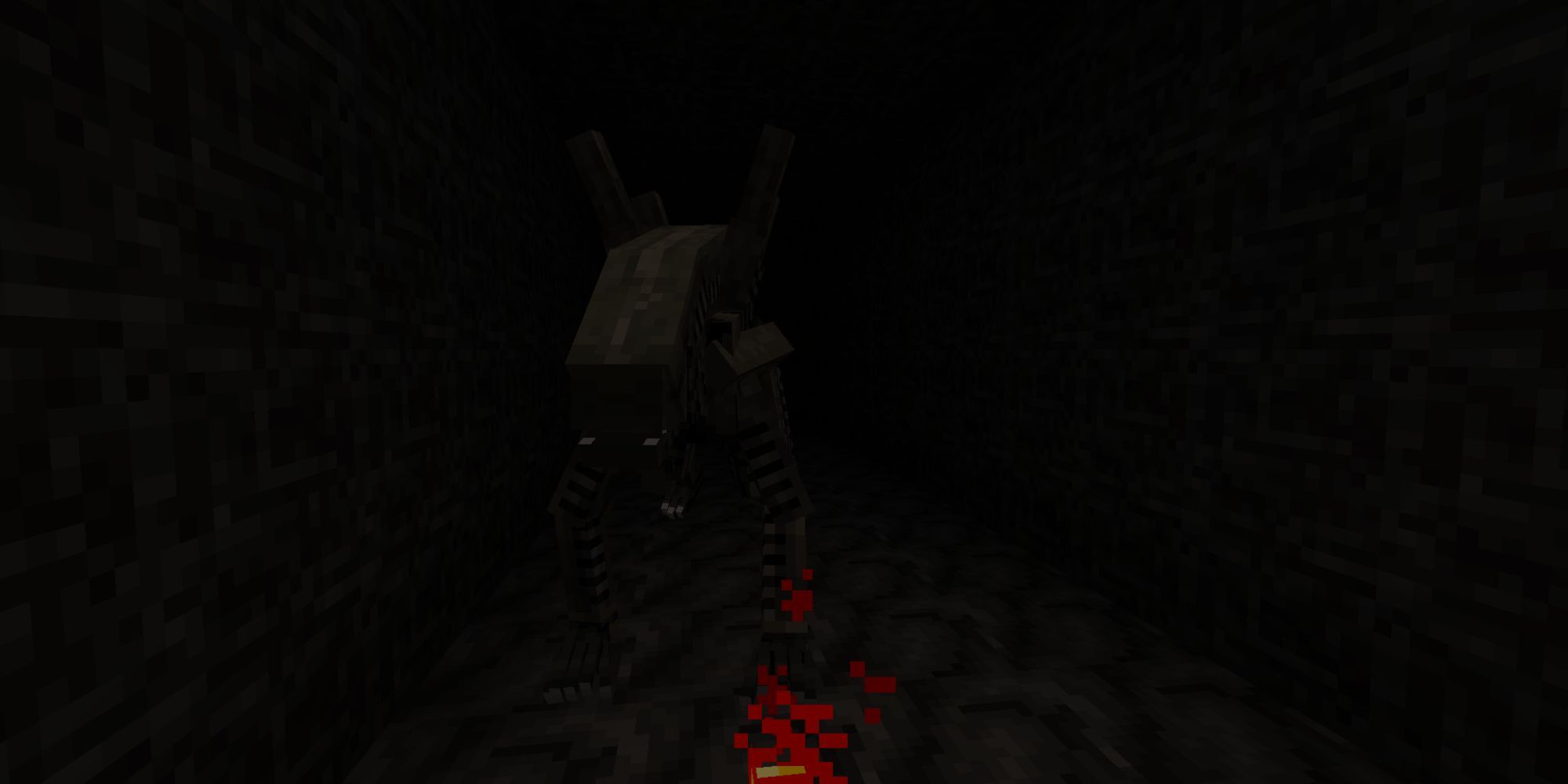 A first-person view of a dark, narrow corridor with a black-skinned alien approaching.