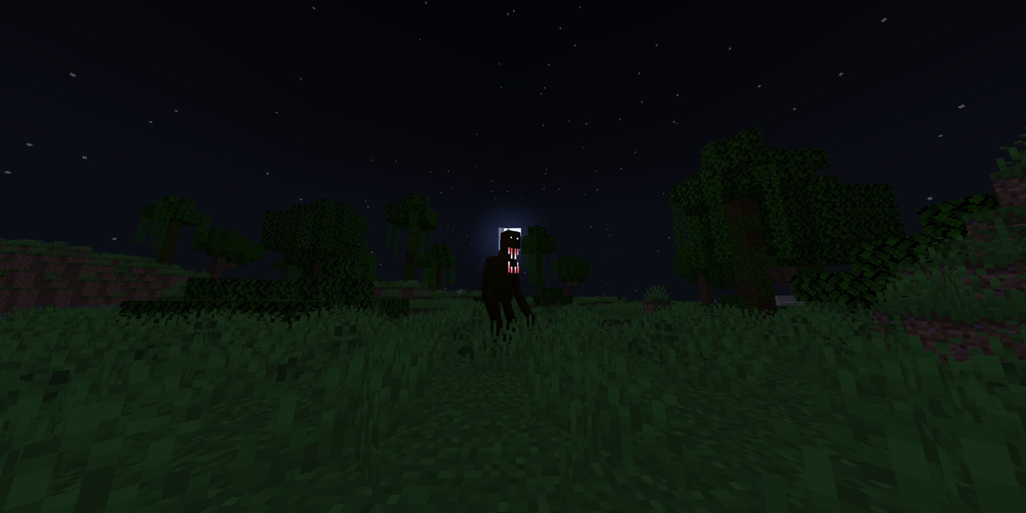 A grassy environment at night, with a tall, black, humanoid figure with a large mouth.
