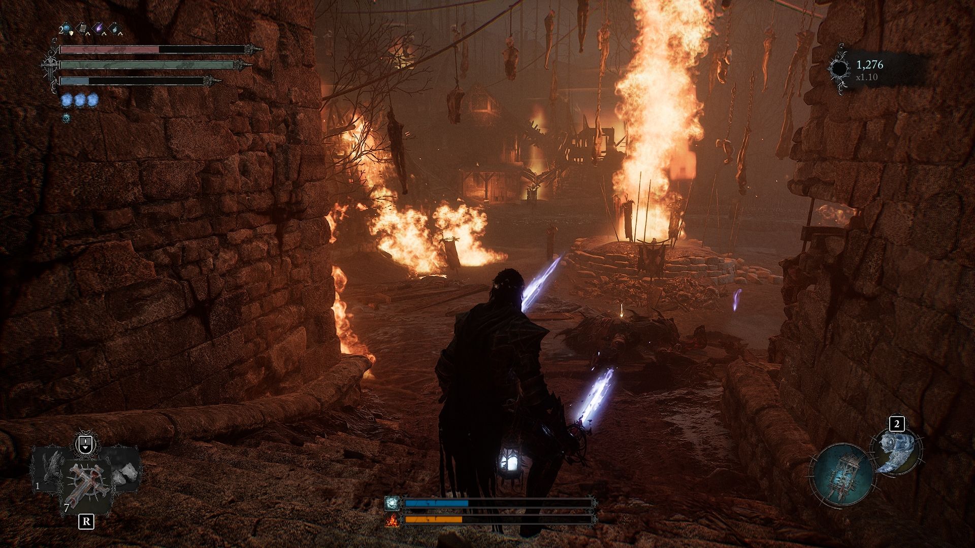 Spieler steht auf einem offenen Gebiet mit lodernden Feuern. Lords of the Fallen