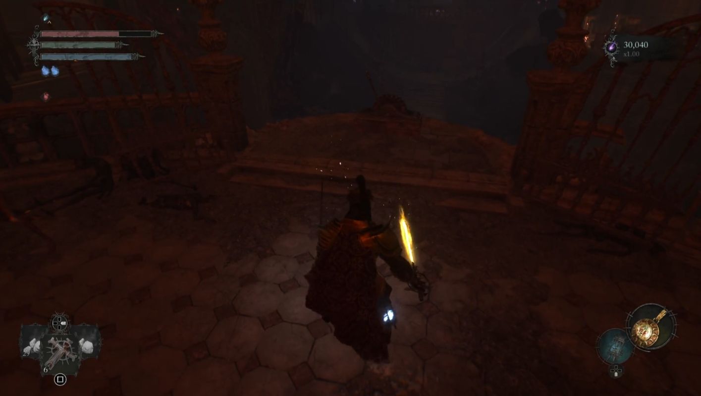 Pulling the lever to lower the spiraling stairs in Lords of the Fallen 