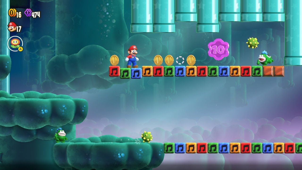 Mario standing on music blocks with a large purple coin to his right. Further right is a spike enemy throwing a spikey ball at him.