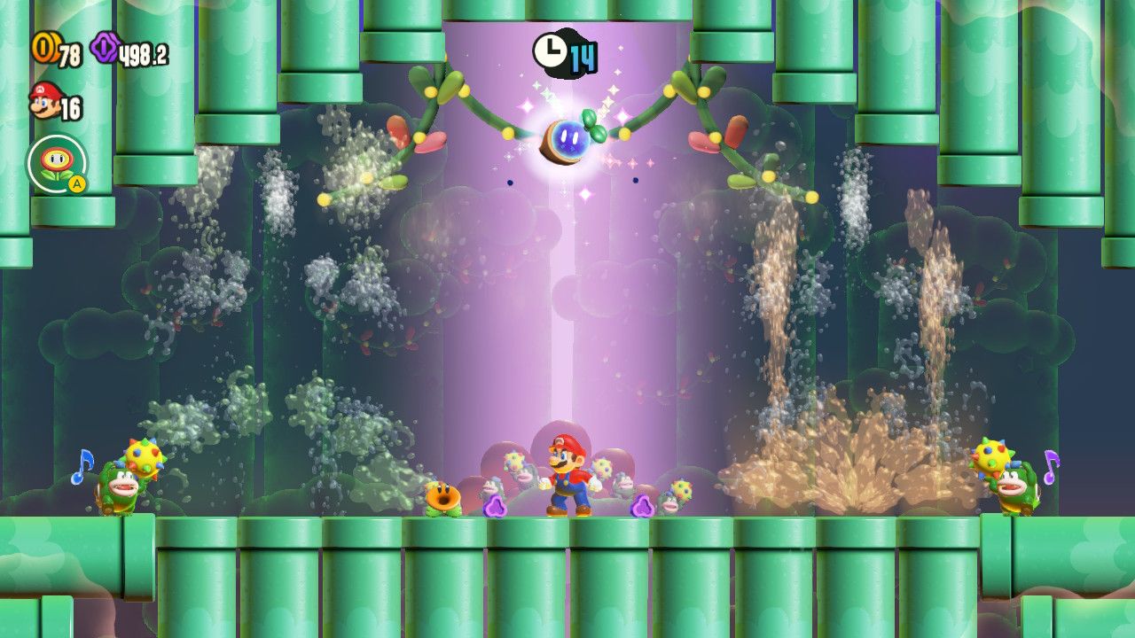 Mario standing on pipes, surrounded by pipes on all sides. A wonder seed and a timer with 14 seconds left are at the top of the screen.