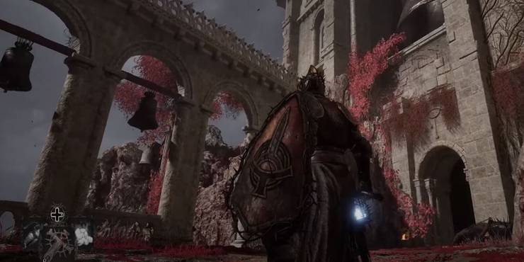 Lamp Bearer looking at bells and exploring world of Lords of the Fallen