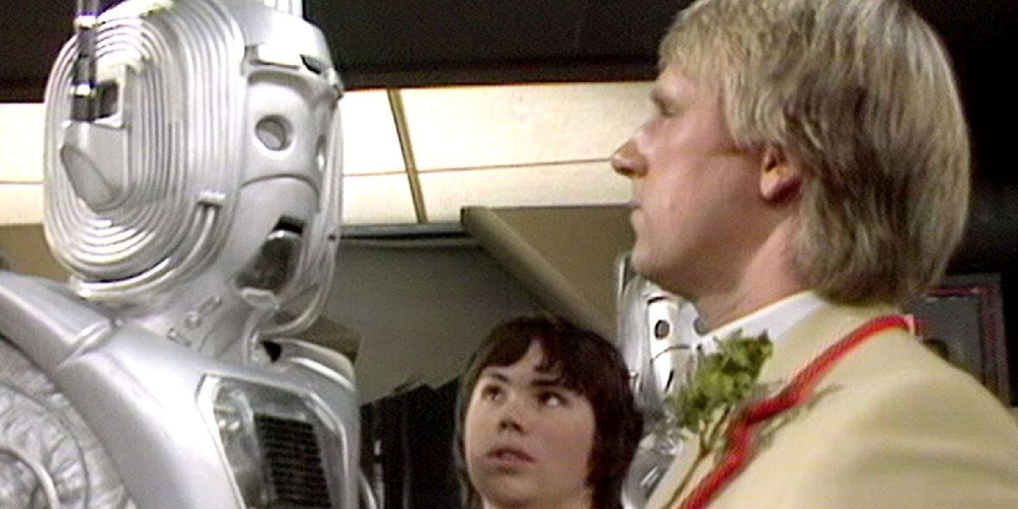 The 5th Doctor and Adric face-to-face with a cyberman in Doctor Who's Earthshock