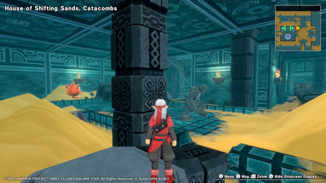 Psaro standing on a broken pillar near enemies and piles of sand in the House of Shifting Sands in Dragon Quest Monsters: The Dark Prince.