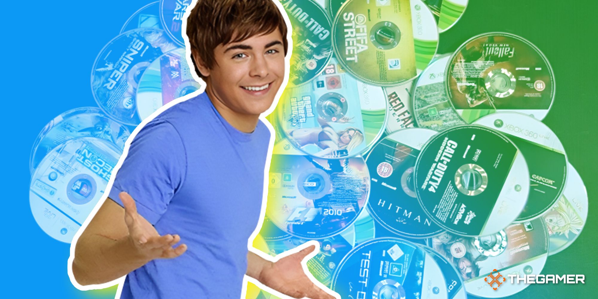 Zac Efron shrugging in front of a pile of video game CDs