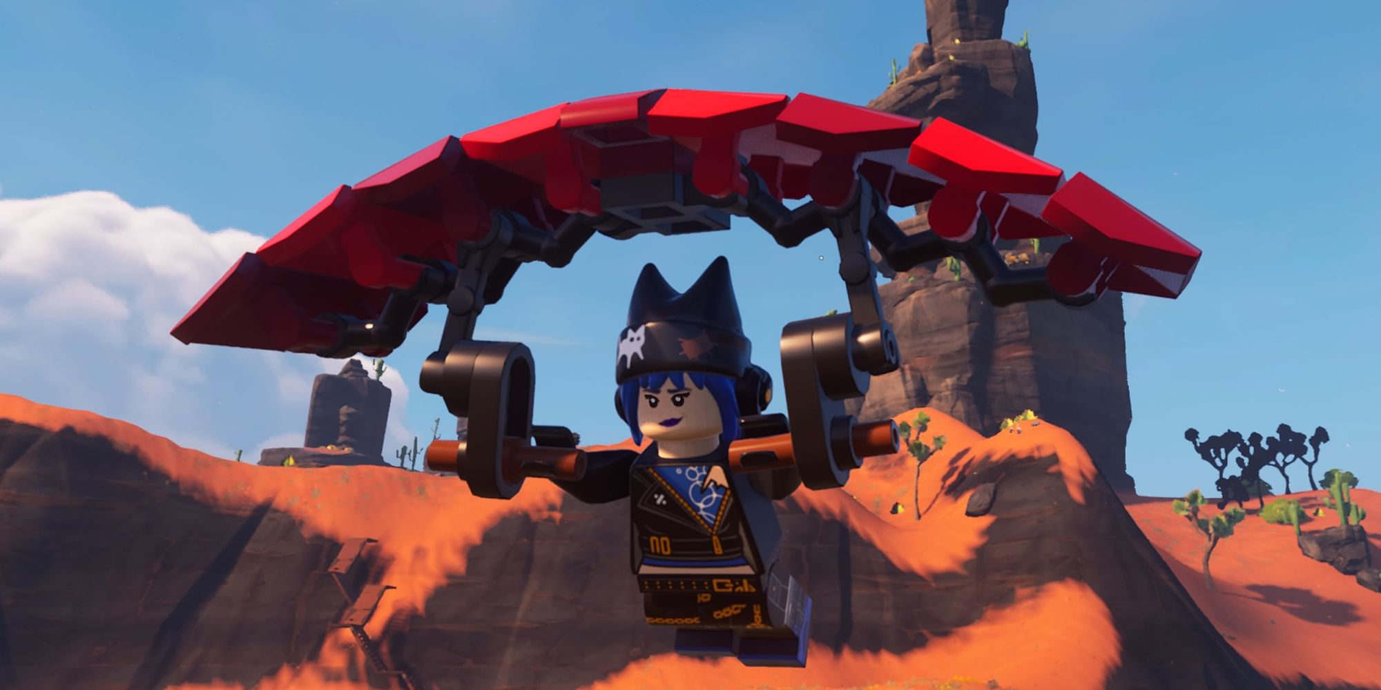 A character gliding over the Dry Valley in Lego Fortnite.