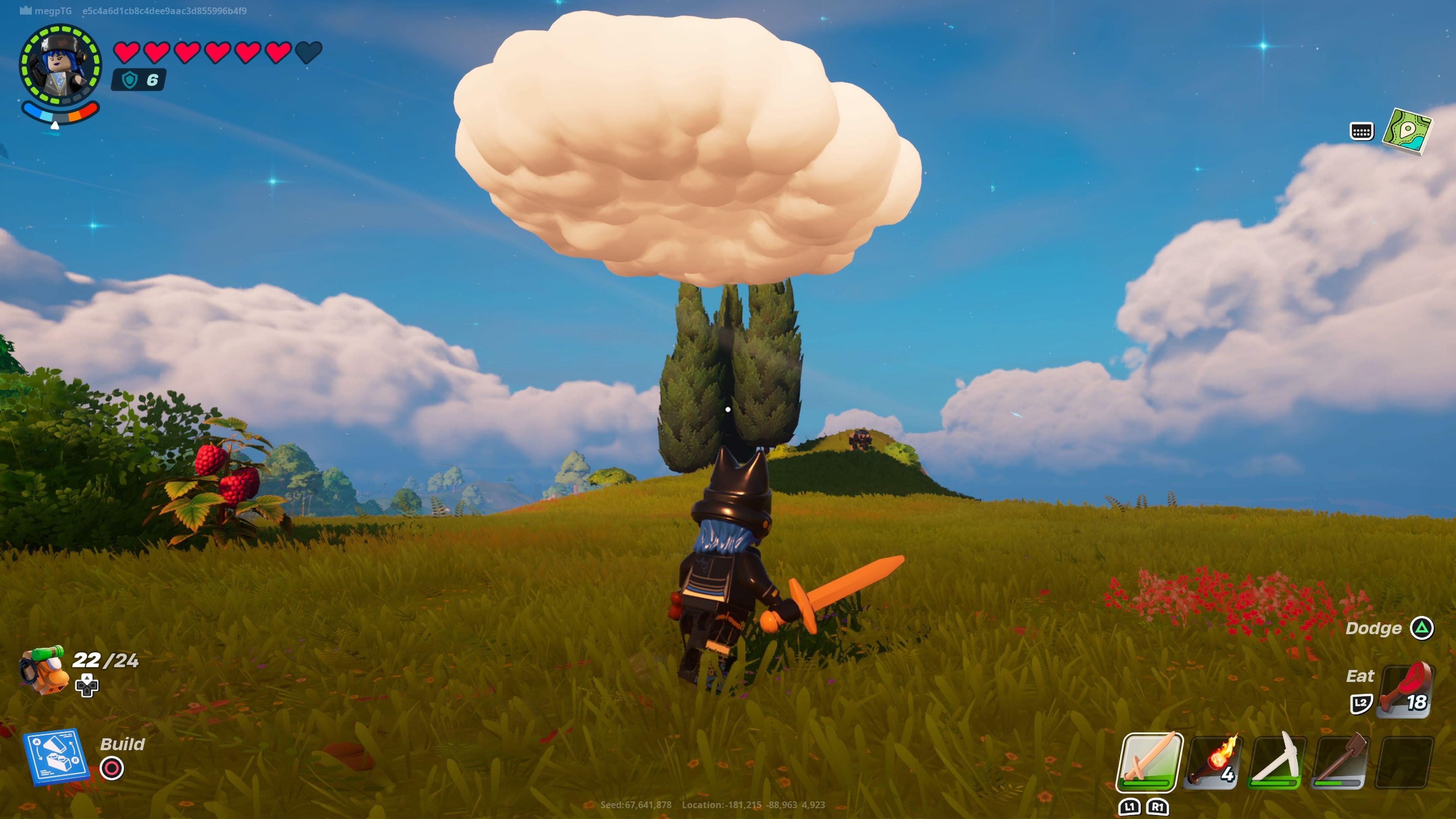 A player below the end of a rainbow in Lego Fortnite, looking up at the cloud.