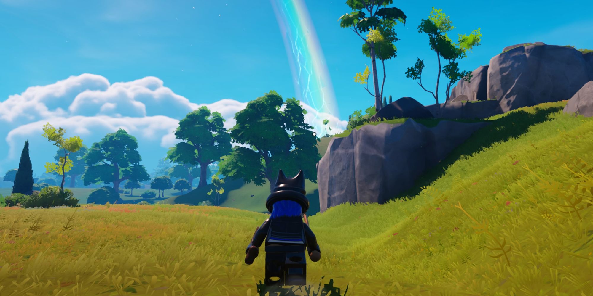 A player running towards a rainbow in Lego Fortnite.