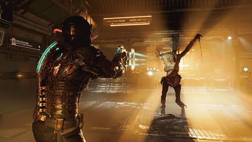 Isaac shooting a Necromorph in Dead Space Remake