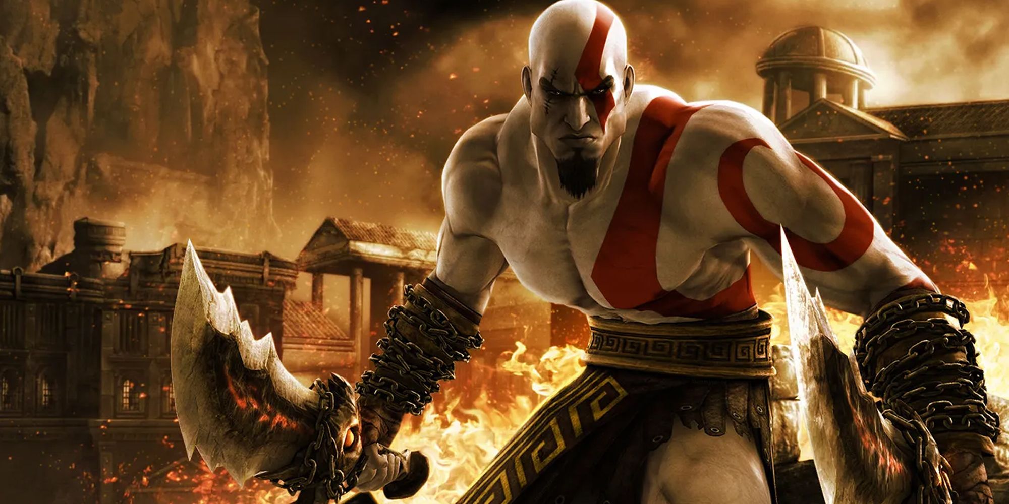 Kratos holding two swords as a city burns behind him in the first God of War