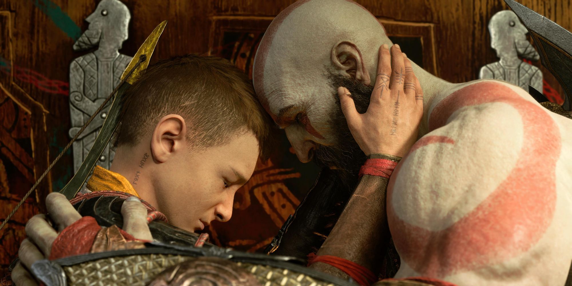 Kratos and Atreus holding each other in God of War Ragnarok.