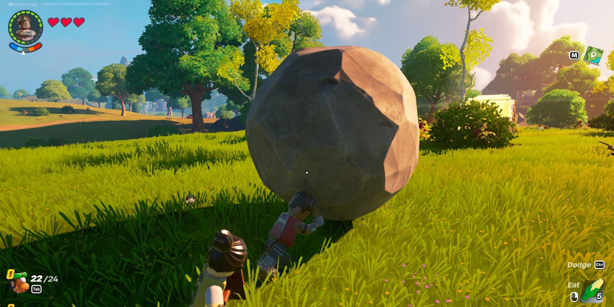 Lego Fortnite one player pushing boulder with second player behind