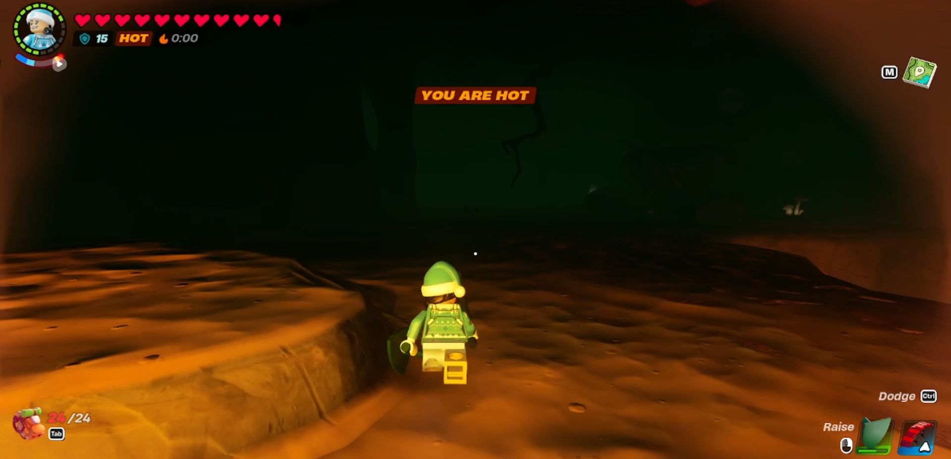 Lego Fortnite avatar traveling through a lava cave. A game message at the top of the screen shows the words "you are hot".