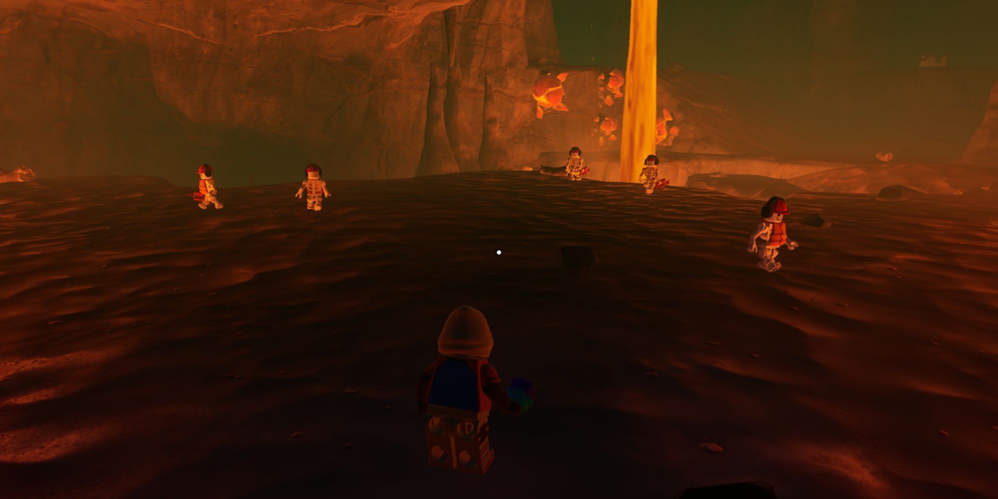 A player sneaking up on five desert cave skeletons inside a hot cave full of lava.