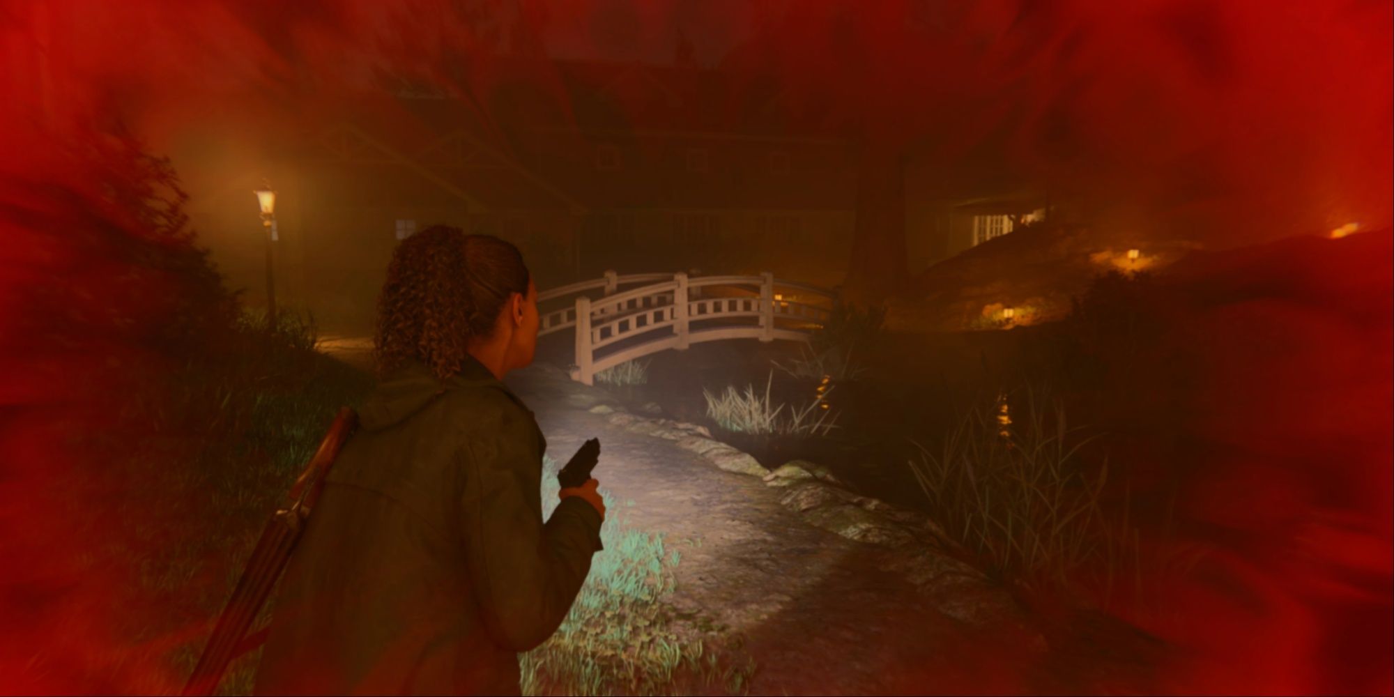 Saga near-death and low on health outside the Valhalla Nursing Home, as shown by the blood effects on the screen.