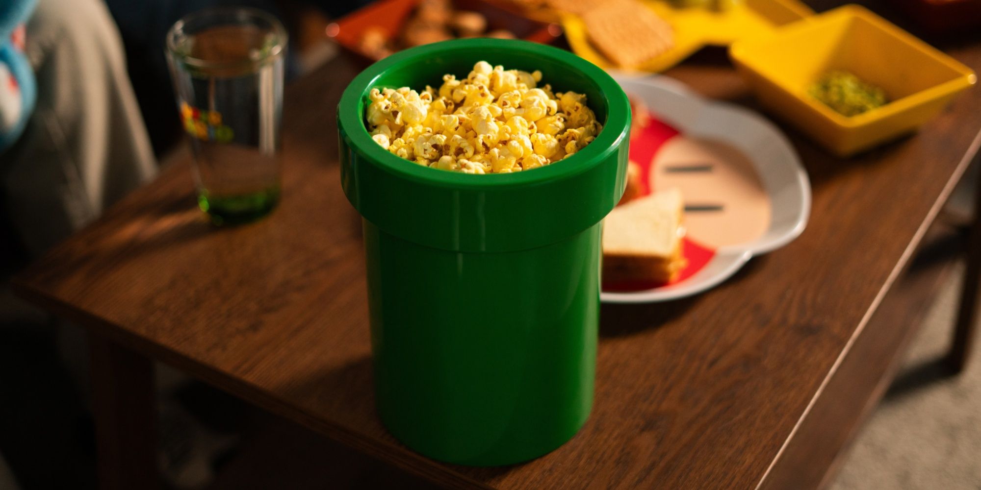 mario warp pipe snack bowl filled with popcorn