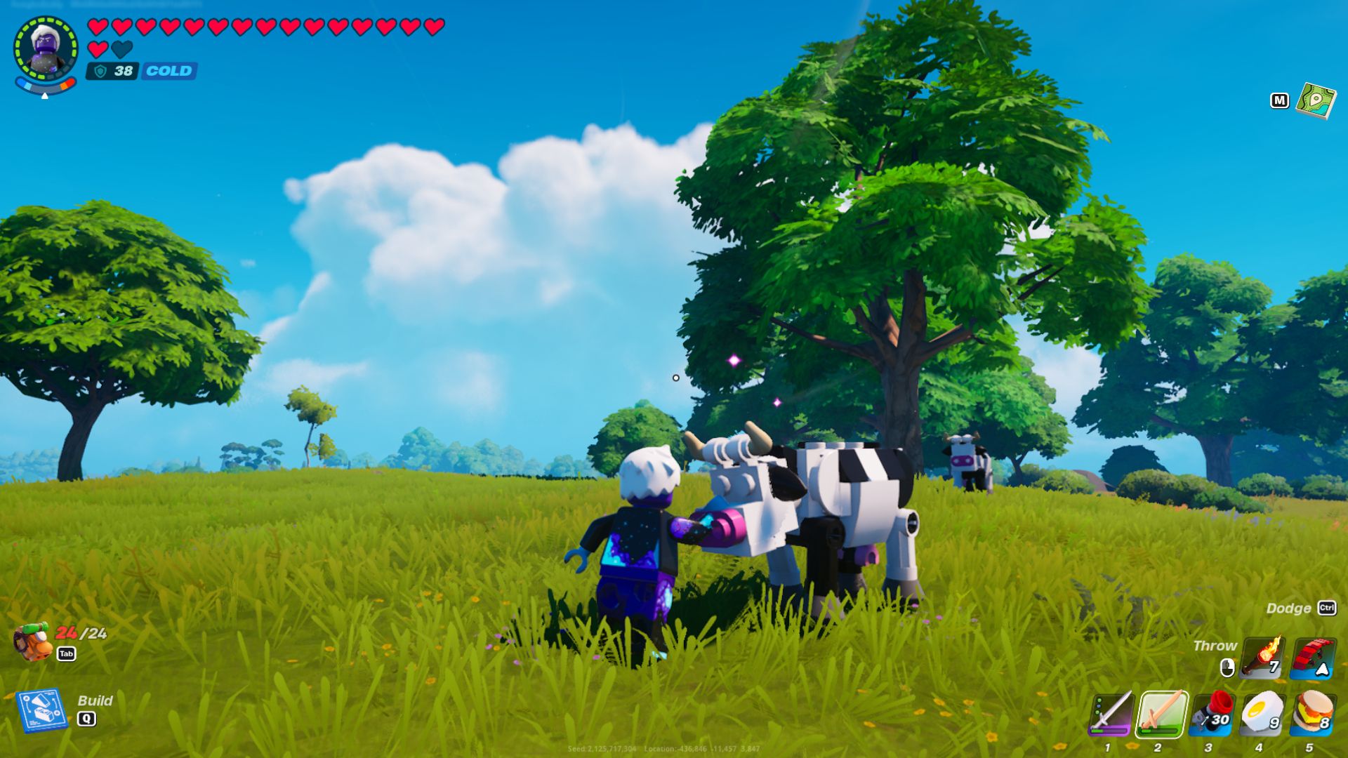 A Lego player pets a Cow.