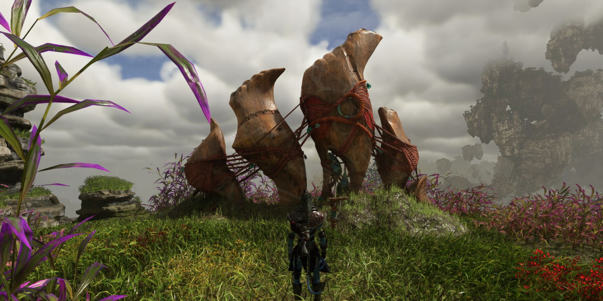 Player standing next to an Aeolian Wind Flute Avatar Frontiers of Pandora