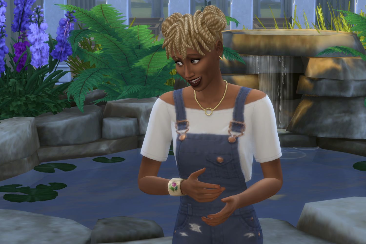 A feminine Sim wearing overalls explains something excitedly