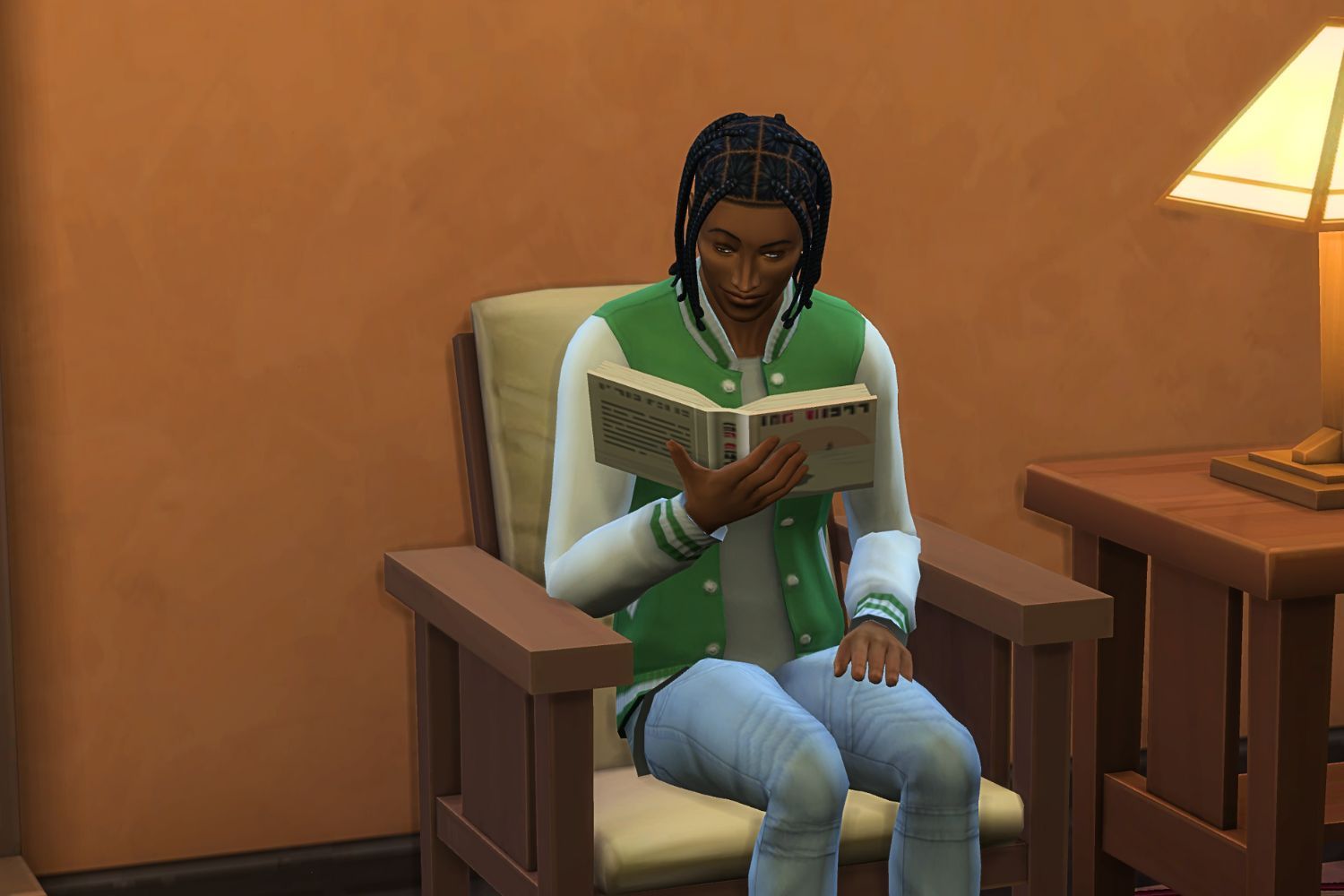 A teenage Sim reads while sitting in an armchair.